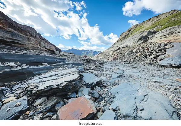 Rocky Mountain Landscape with Blue Sky and Clouds