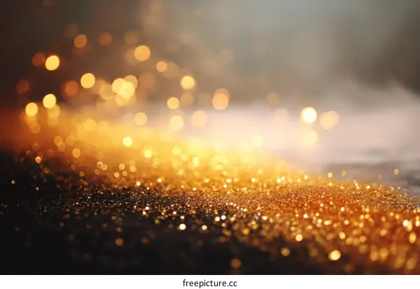 Golden Glitter Background with Bokeh Lights