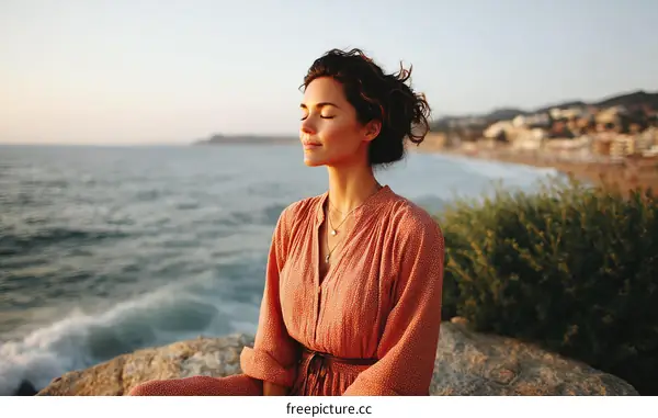 Peaceful Woman Contemplating the Ocean Sunset