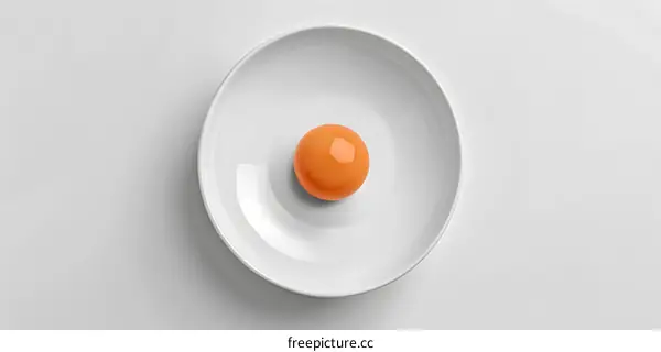 Egg Yolk in a White Plate