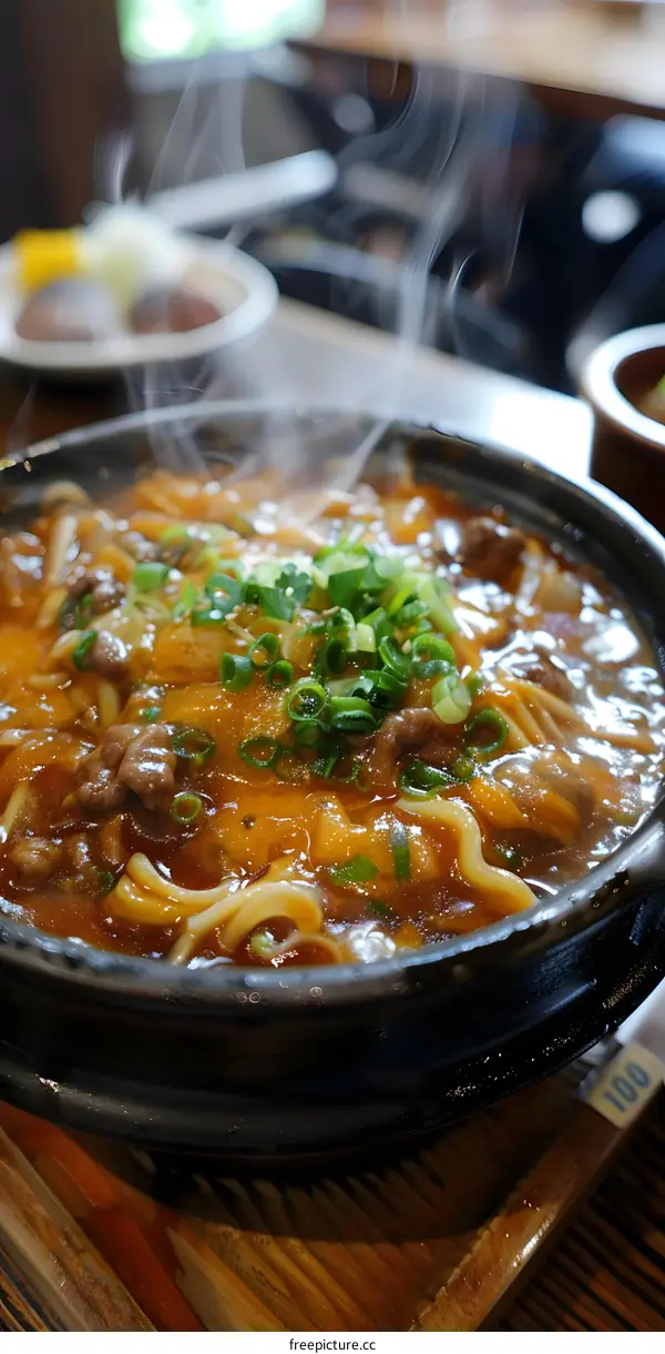 A bowl of delicious Japanese noodle soup with beef and vegetables