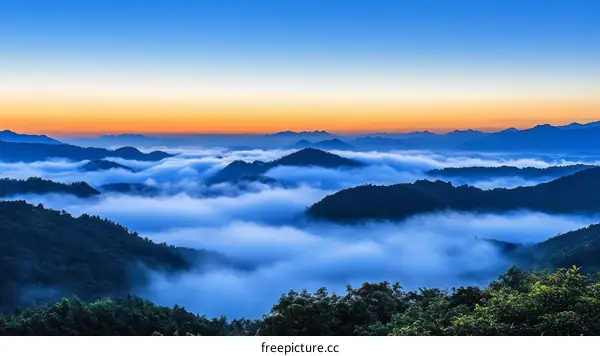 Misty Mountain Sunrise Scenery