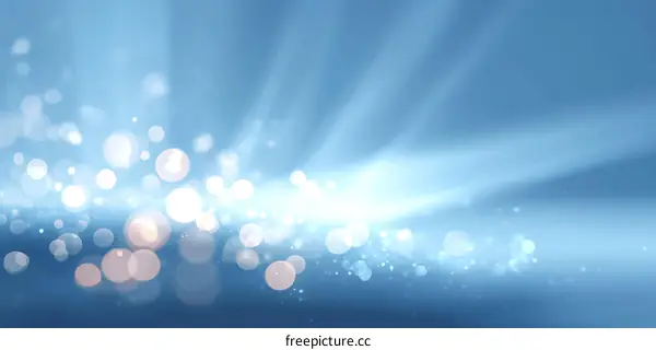 Abstract Light Blue Background with Sparkling Particles