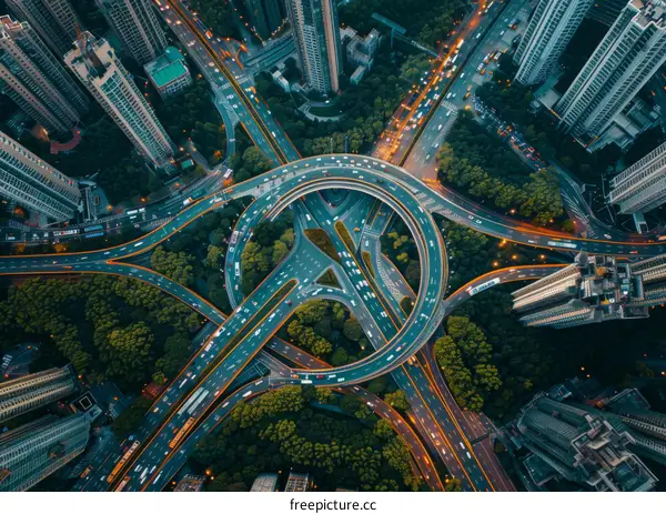 Urban Road Interchange at Night - Aerial View