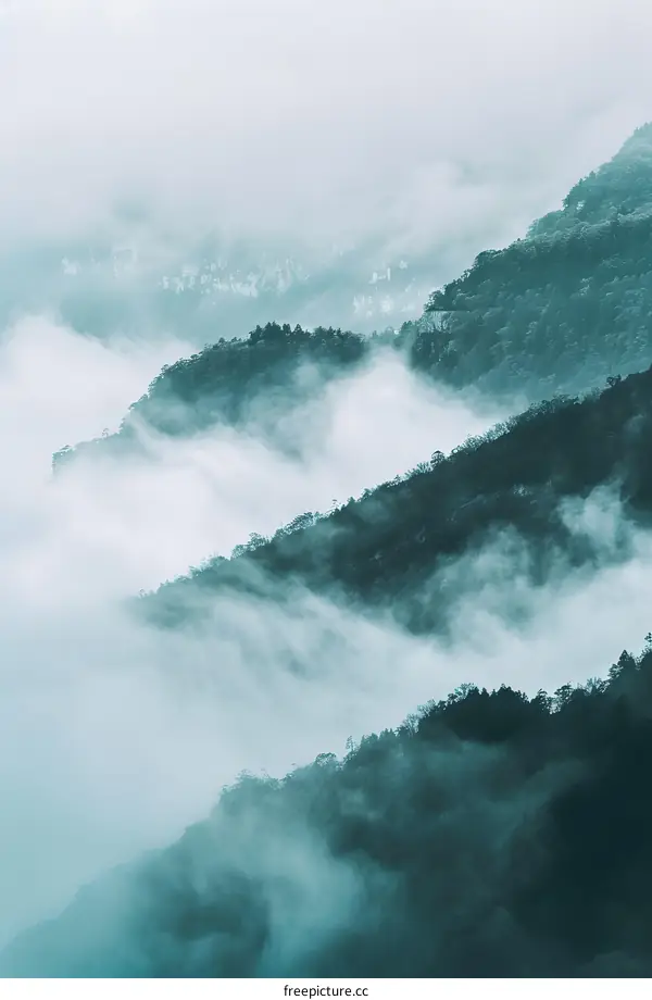 Misty Mountain Landscape With Rolling Hills