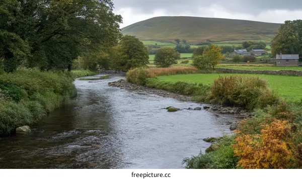 Autumnal River Landscape in a Countryside Valley