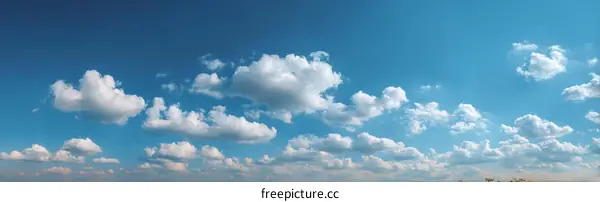 Beautiful Sky with Fluffy Clouds