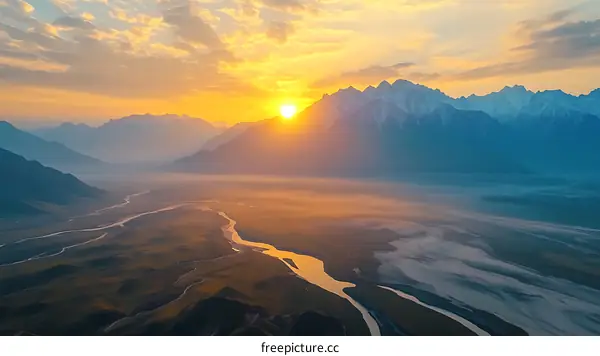 Sunrise over Mountain Valley Landscape