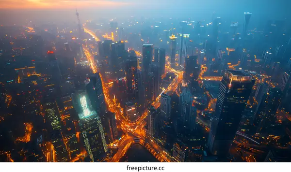 Aerial View of a Modern City at Night
