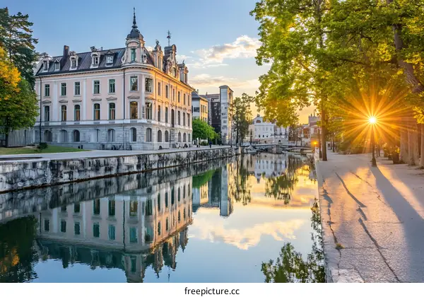 Sunrise Over Canal And Historic Building in Ljubljana Slovenia