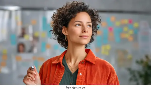 Focused Woman in Creative Office Space