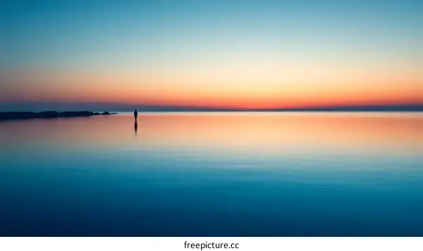 Solitude at Sunrise on Calm Water