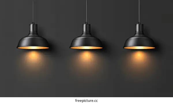 Three Stylish Hanging Lamps Against a Dark Background