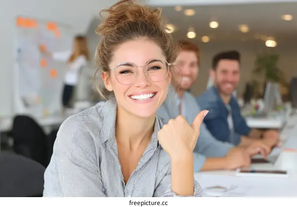 Happy Woman in a Modern Office Setting