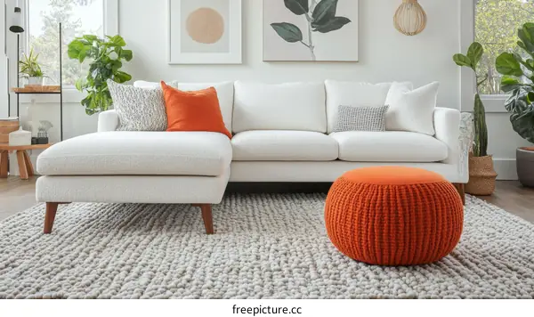 Modern Living Room with Orange Ottoman