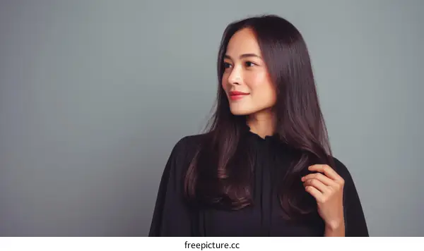 Elegant Asian Woman Portrait in Studio Setting