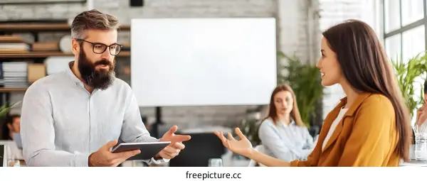 Business Meeting in Modern Office Space with Whiteboard and Plants