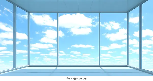 Corner Window View with Blue Sky and White Clouds