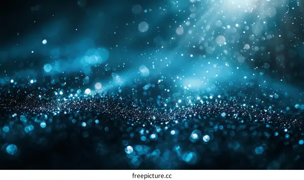 Blue Glitter Sparkles on Dark Blue Background