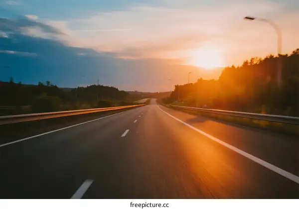 Sunset view of an empty highway with golden light