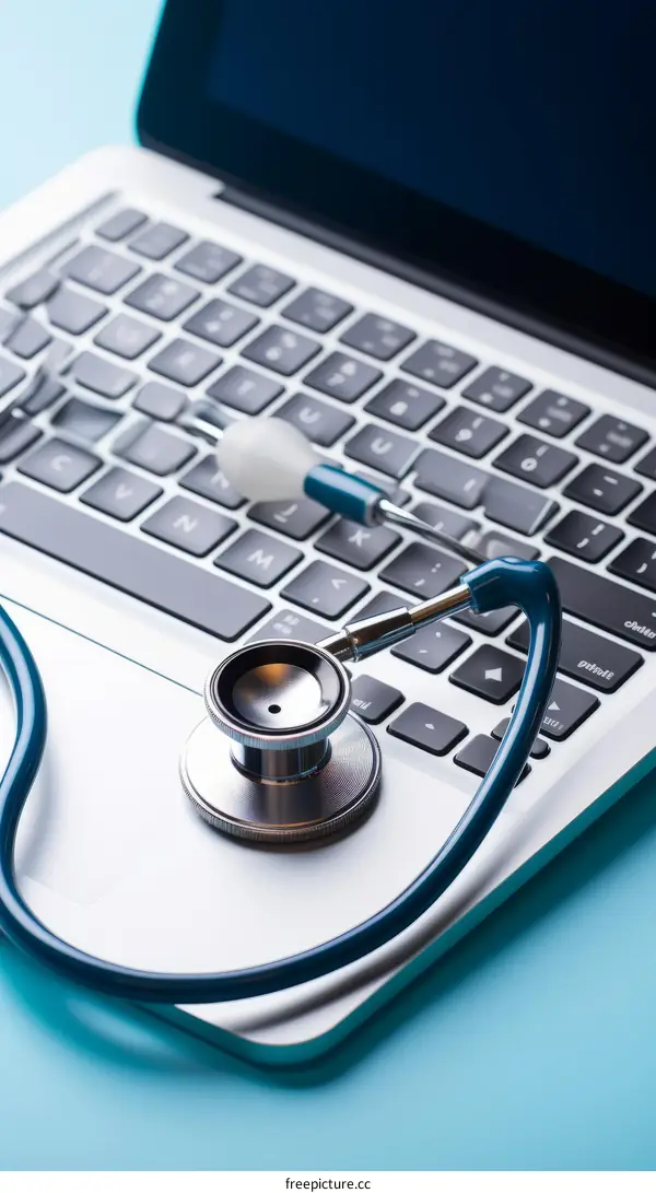 Stethoscope on Laptop Keyboard: Healthcare and Technology