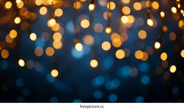 Golden Bokeh Lights on Dark Background