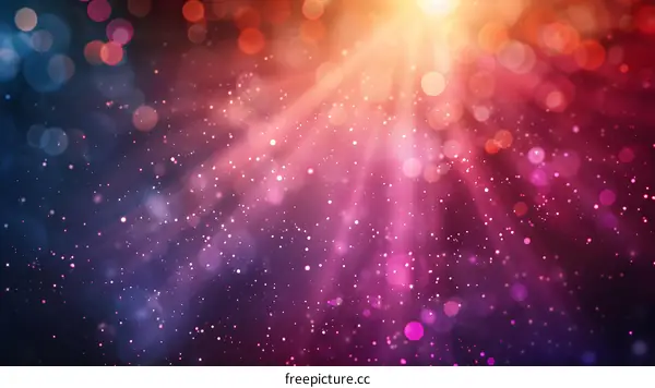 Colorful glowing lights with shiny particles on dark background