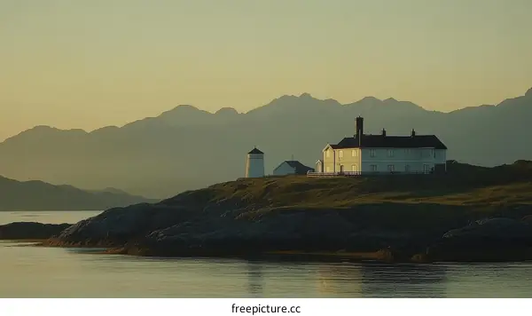 Coastal Lighthouse and House at Sunrise