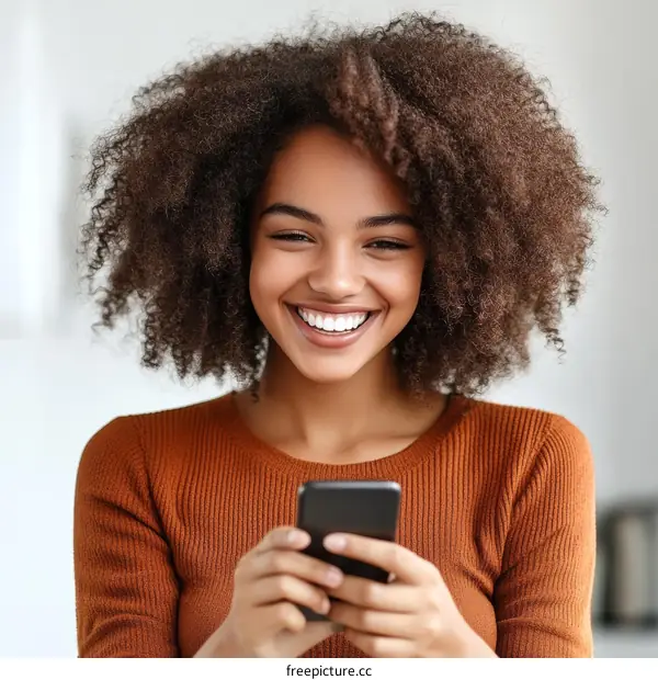 Smiling Woman Using Smartphone