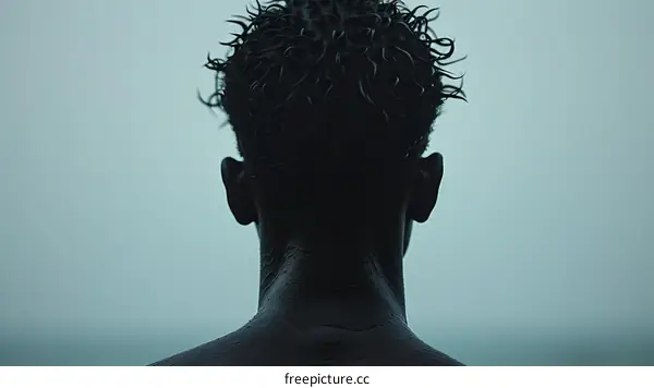 Portrait of a black man with curly hair