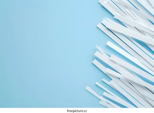 White Paper Strips on Blue Background