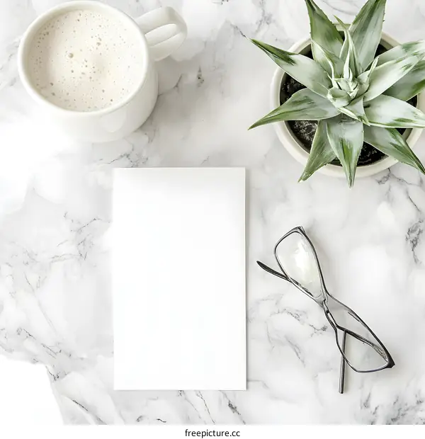 Blank Paper Mockup on Marble Tabletop
