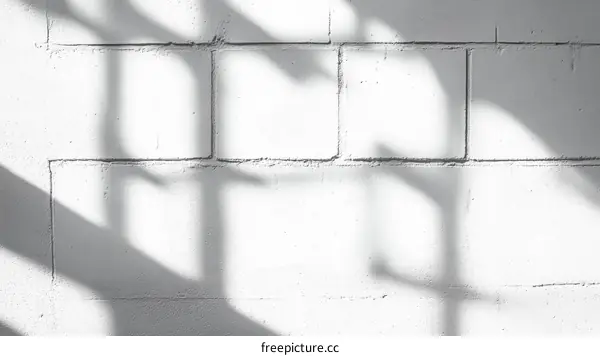 White Brick Wall with Shadow Patterns