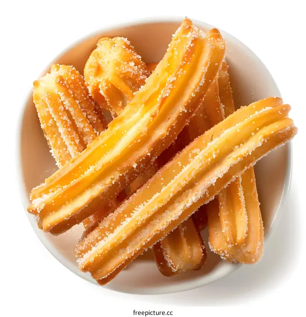 Churros with sugar in a bowl
