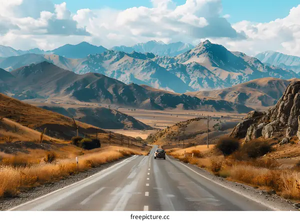 Asphalt Road Leading Through Mountains