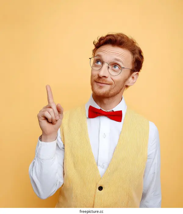 Man in Yellow Vest Points Upward